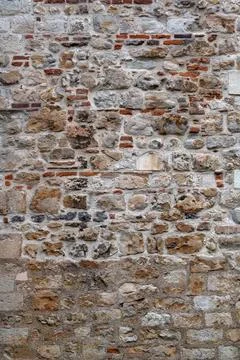 Background texture of old medieval stone wall Stock Photos