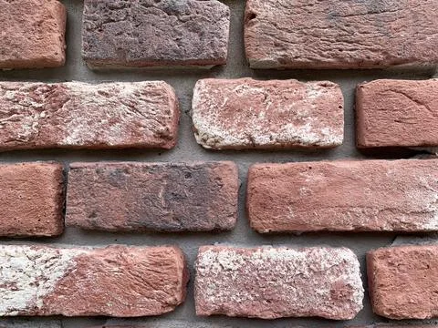 Background, texture of an old red brick wall. Studio Photo Stock Photos