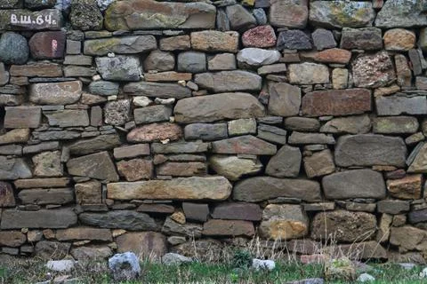 Background texture of an old stone wall Stock Photos