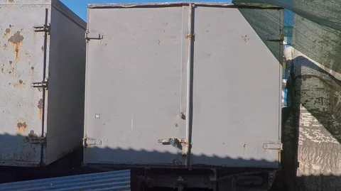 Background texture of old trucks view from the side of the doors to the booths Stock Footage 124626208