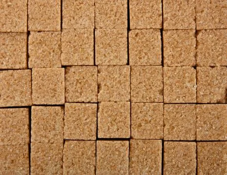 Background texture pattern of brown sugar cubes Foto stock