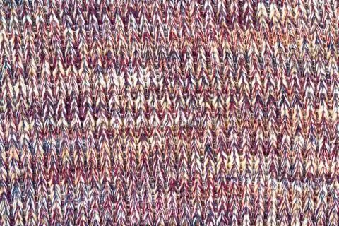 Background texture of pattern knitted fabric made of cotton or wool closeup Stock Photos