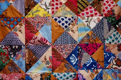 Background texture of pieces of old carpets with stitching thick threads Stock Photos