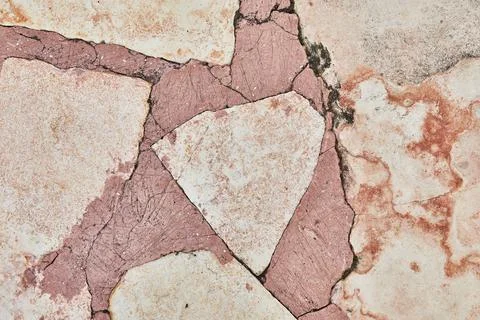 Background texture of pink marble with red concrete flooring in cafe Stock Photos