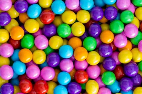 Background texture of rainbow colored sugar candy Stock Photos