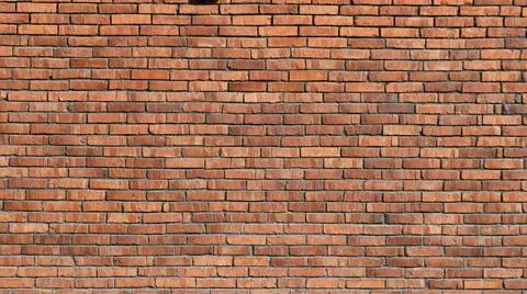 Background texture of a red bright brick wall with empty copy space Stock Photos