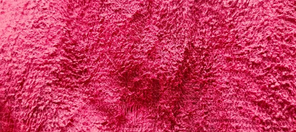 The background texture of the red fabric is irregular and wavy Stock-Fotos