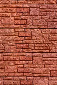 Background texture red, stone brick wall. Surface with a brickwork  Stock Photos