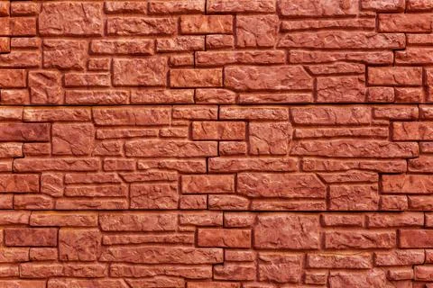 Background texture red, stone brick wall. Surface with a brickwork of brick.. Stock Photos