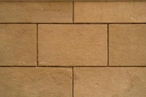 Background texture of restored old wall, pattern and symmetry, orange recta.. Foto stock