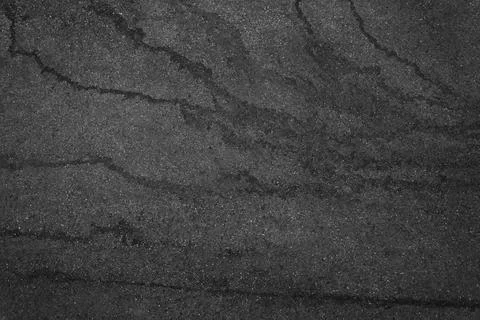 Background texture of rough asphalt top view. Stock Photos