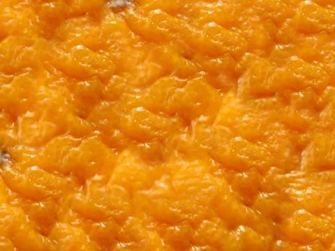 Background texture of rough relief orange peel on top Stock Photos