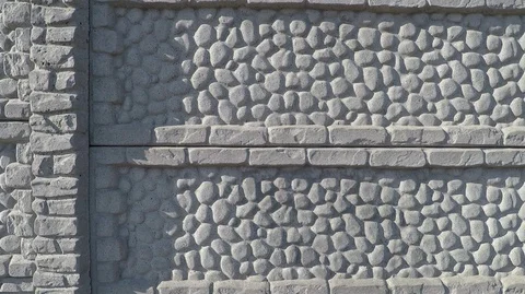 Background texture section of concrete fence with a drawing of imitation stone Stock Footage 127702215