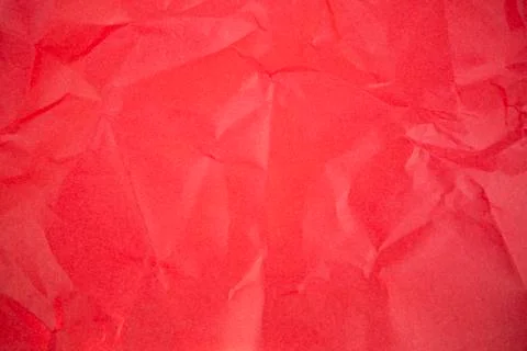 Background texture of a sheet of red crumpled paper Stock Photos