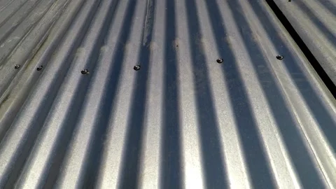 Background texture from sheets of galvanized unpainted wave metal Stock Footage 130449040