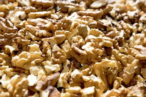 Background, texture, of shelled walnuts Stock Photos