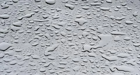 Background texture Small droplets of water accumulate on a glass surface Foto stock