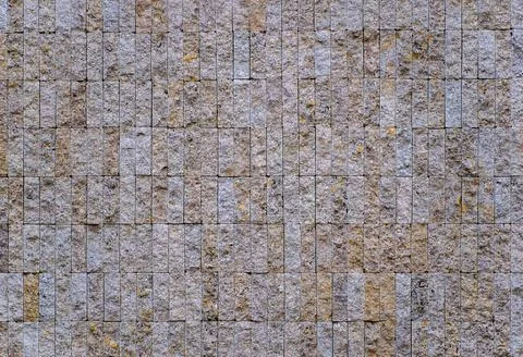 Background, texture of small stone segments vertically oriented 写真素材