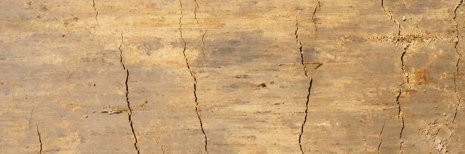 Background texture from the smooth surface of the sand. top view. banner Stock Photos