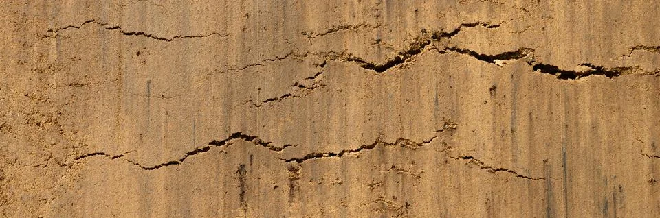 Background texture from the smooth surface of the sand. top view. banner Stock Photos