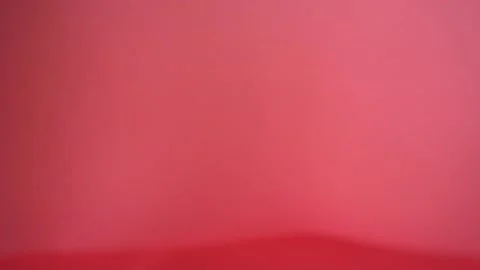 A background texture of soft red fabric textile material reverse moving. Stock Footage 87714043
