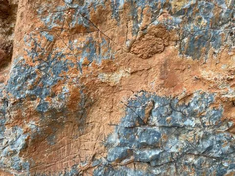 Background, texture, stone natural yellow red surface natural sharp convex .. Stockfoto's