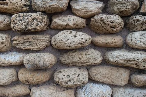 Background texture of stone wall. Natural stone, a wall of natural stone Stock-Fotos
