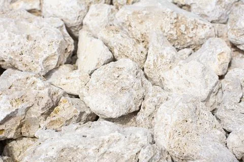 Background, texture of stones. A close-up of rubble. Stock Photos