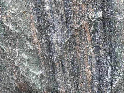 Background texture: the structure of a large stone. Granite boulder close up. Foto stock