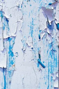 Background texture. Surface with blue and white old cracked paint. Vertical Foto stock
