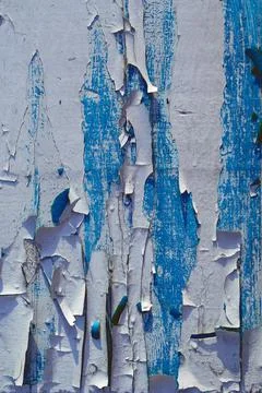 Background texture. Surface with blue and white old cracked paint. Vertical Stock Photos