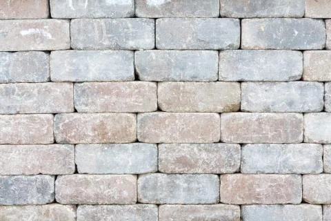 Background texture of a tumbled brick wall Stockfoto's
