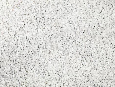 Background from texture of uncooked rice Stock Photos
