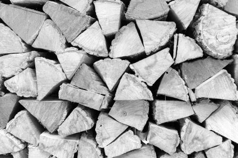 Background, texture of the wall from the folded logs. Black and white. High c Stock Photos