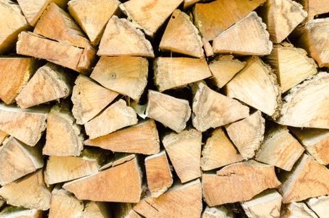 Background, texture of the wall from the folded logs. Stock Photos