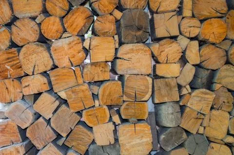 Background, texture of the wall from the folded logs. Stock Photos