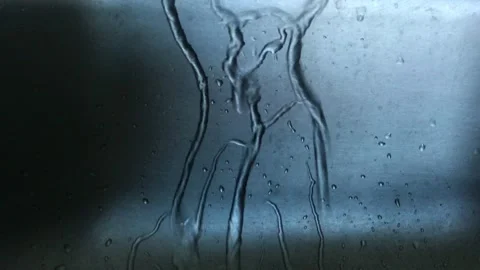 Background texture water flows down the glass Stock Footage 160026230