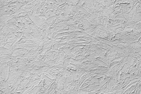 Background with texture of wavy gray paint on the wall. Stock Photos