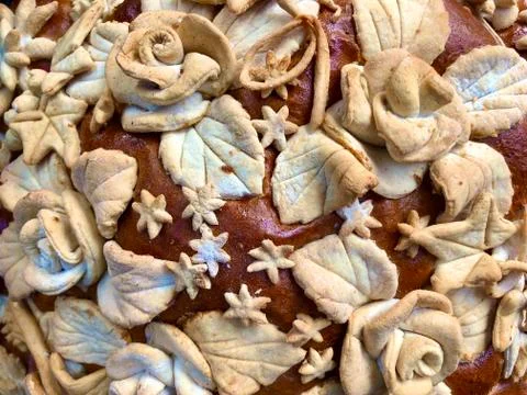 Background texture: wheat bread with patterns. Traditional bread for the holi Stock Photos