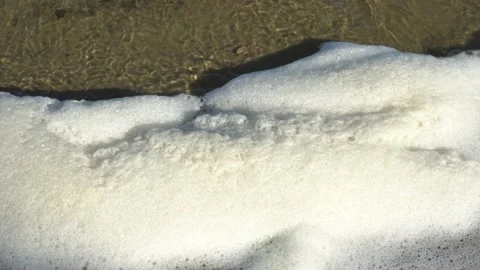 Background texture white foam from the waves in the river Stock Footage 139210873