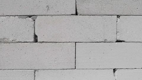 Background texture white wall of concrete blocks, filmed during the construction Stock Footage 124116009