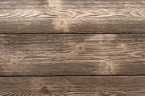 Background texture of wood parallel boards stacked horizontally gray brown pa Stock Photos