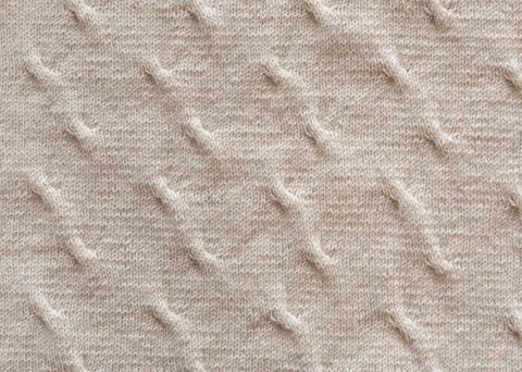 Background texture of wool threads. Texture, knitted pattern close-up. Stock Photos