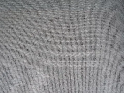 Background texture of woven fabric. Close-up of the surface of intertwined .. Stock Photos