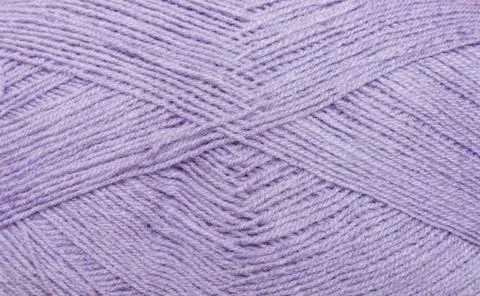 Background thread for knitting. Knitting pattern of colorful yarn wool. Foto stock