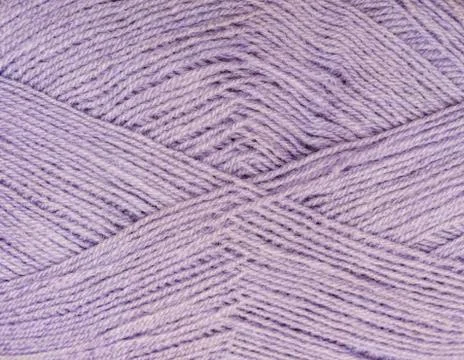 Background thread for knitting. Knitting pattern of colorful yarn wool. Foto stock