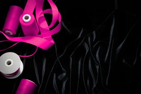 Background threads, ribbons on a black , pink, Magenta Stock Photos