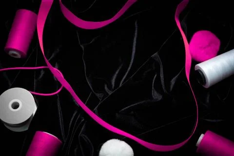 Background threads, ribbons on a black , pink, Magenta Stock Photos