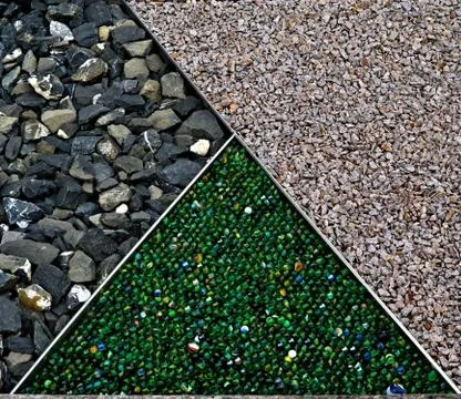 Background of three sections - green marbles, stones, and gravel Stock Photos