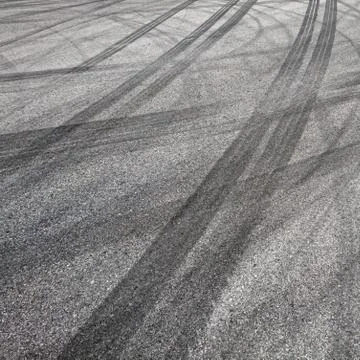 Background with tire marks on road Stock Photos